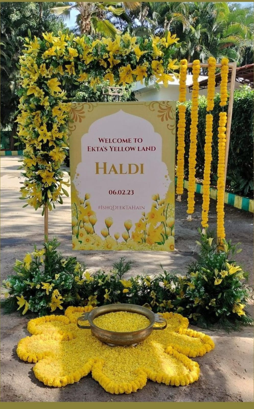 Haldi Ceremony Yellow Floral Decor with Welcome Board and Flower Arch